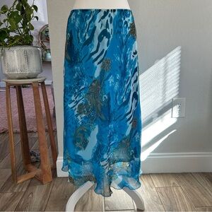 Y2K blue patterned maxi skirt with animal print and gold accents